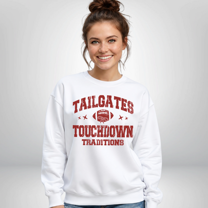 White crewneck sweatshirt displays the Tailgates & Touchdown Traditions design on a smiling woman in a bright studio.