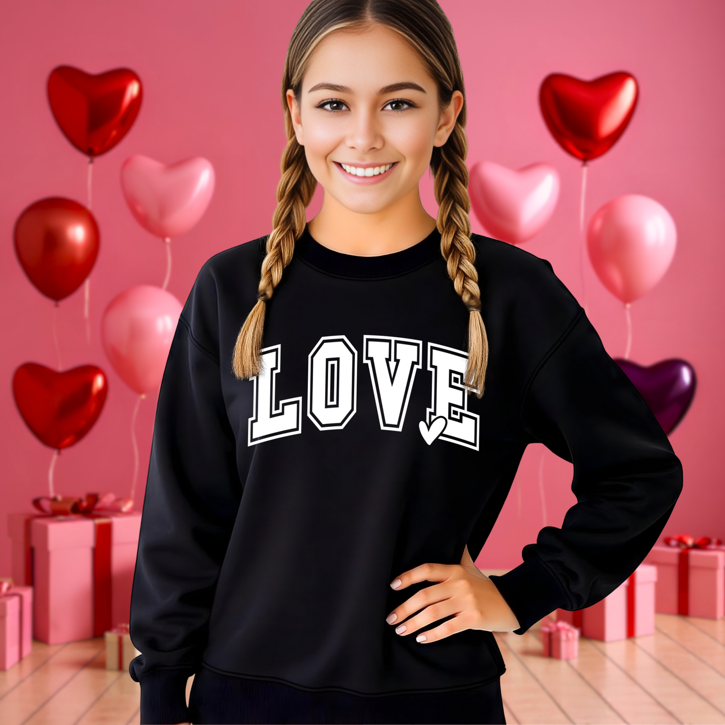 Teen wearing a Black cozy LOVE sweatshirt 