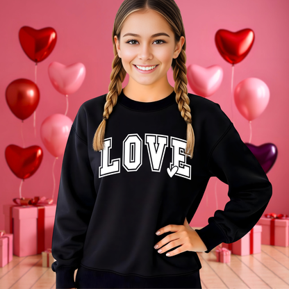 Teen wearing a Black cozy LOVE sweatshirt 