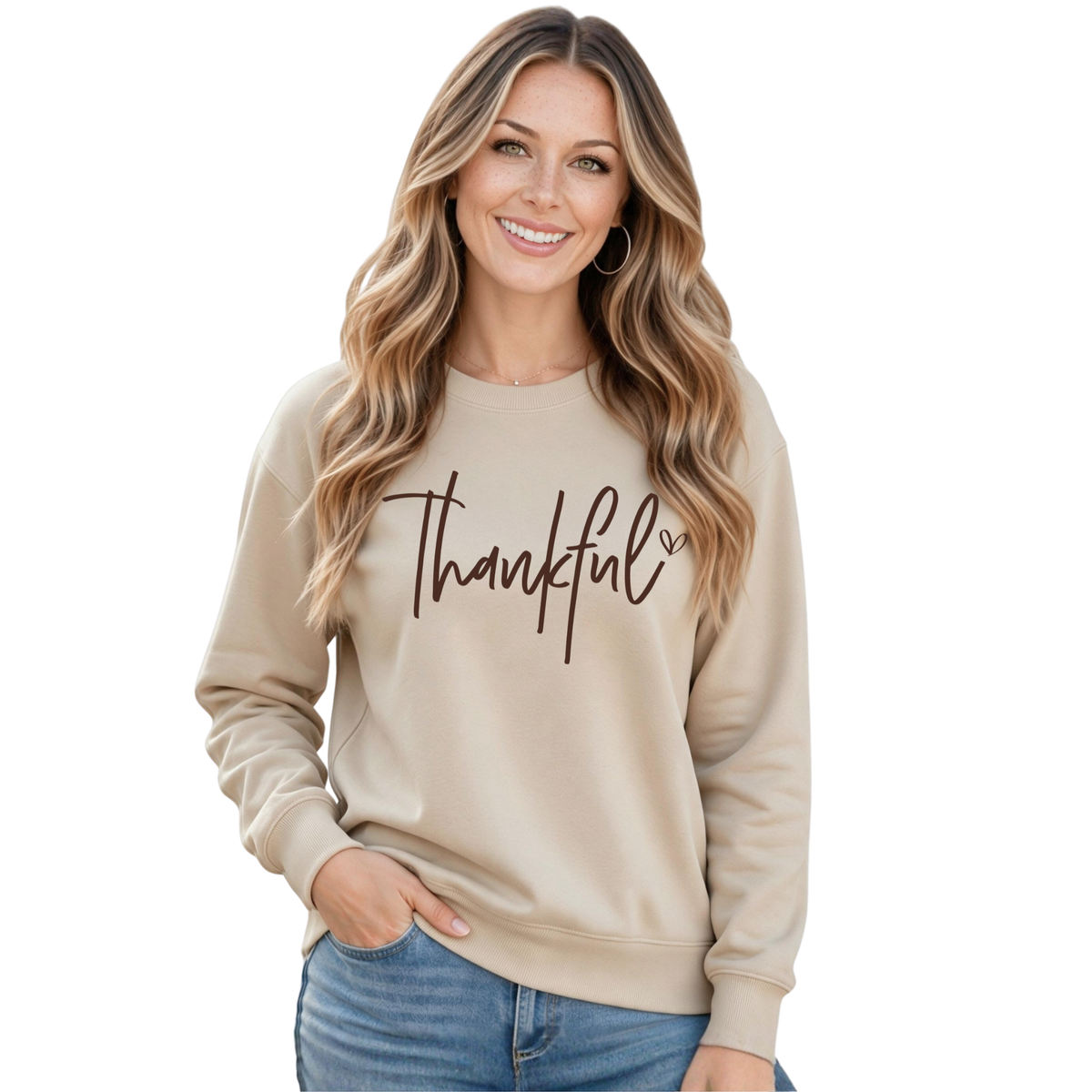 Woman modeling a sand crewneck sweatshirt with a brown Thankful script design on a white background