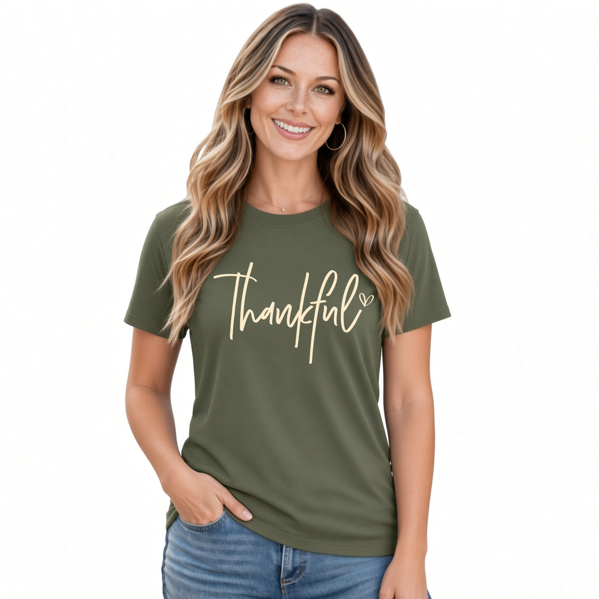 Woman modeling a military green T-shirt with a white Thankful script design on a white background