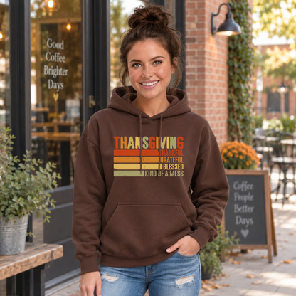 Woman wearing a brown hoodie with retro Thanksgiving Kind of a Mess design outside a fall coffee shop.