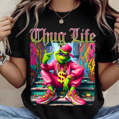 Black oversized t-shirt with bright Thug Life graphic, street art background, colorful detailed print.