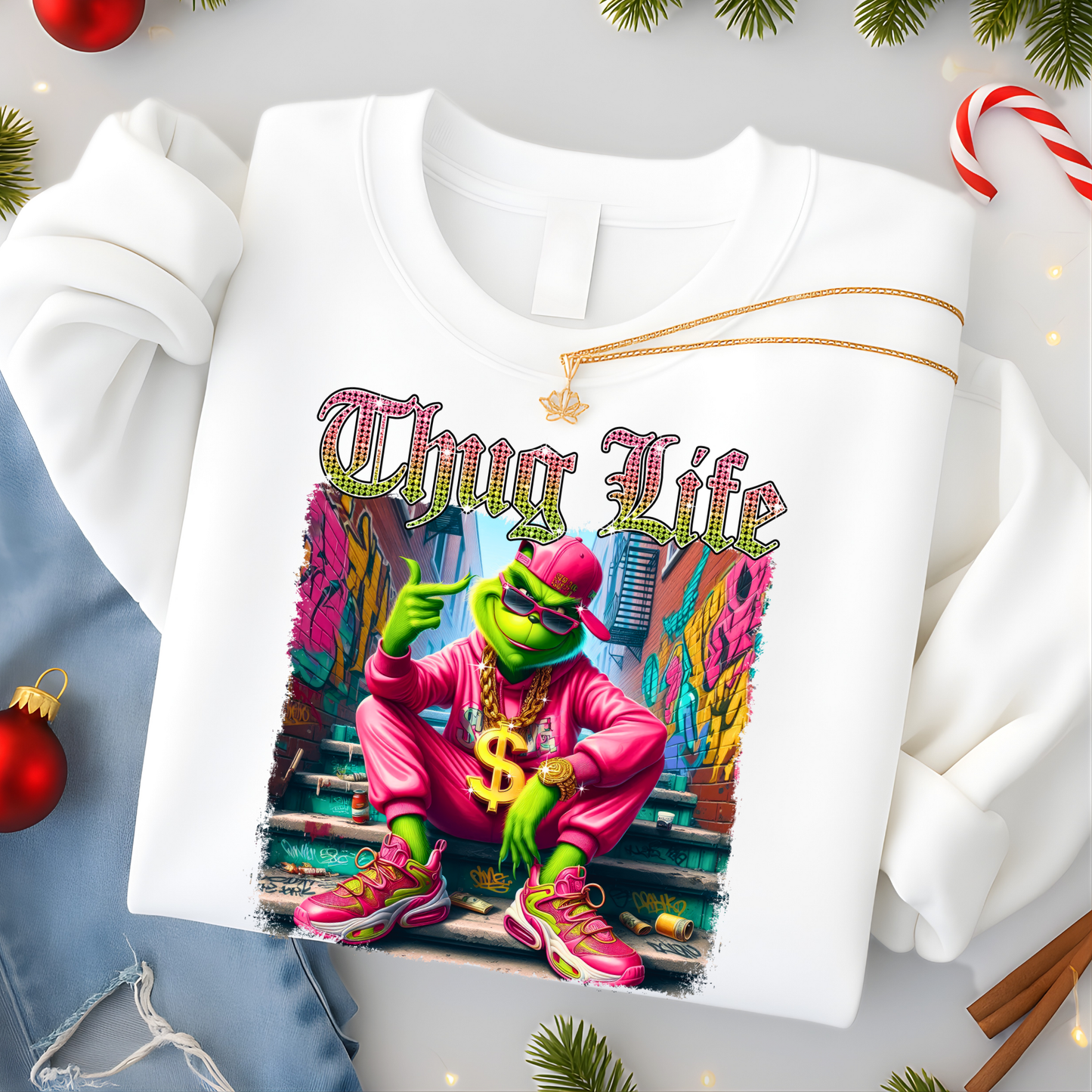 White sweatshirt featuring Thug Life street graphic with vibrant neon colors and urban scene.