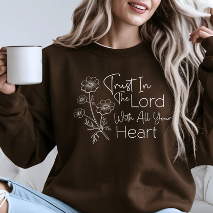 Woman wearing a brown sweatshirt with a motivational quote and holding a mug. Perfect for Autumn