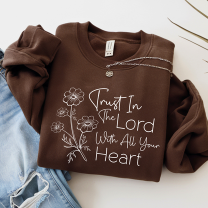 Brown Fall sweatshirt with 'Trust In The Lord With All Your Heart' text and floral designs on a white background.