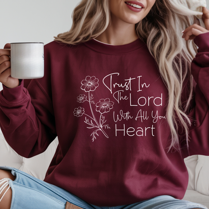 Maroon women’s faith sweatshirt with floral lettering