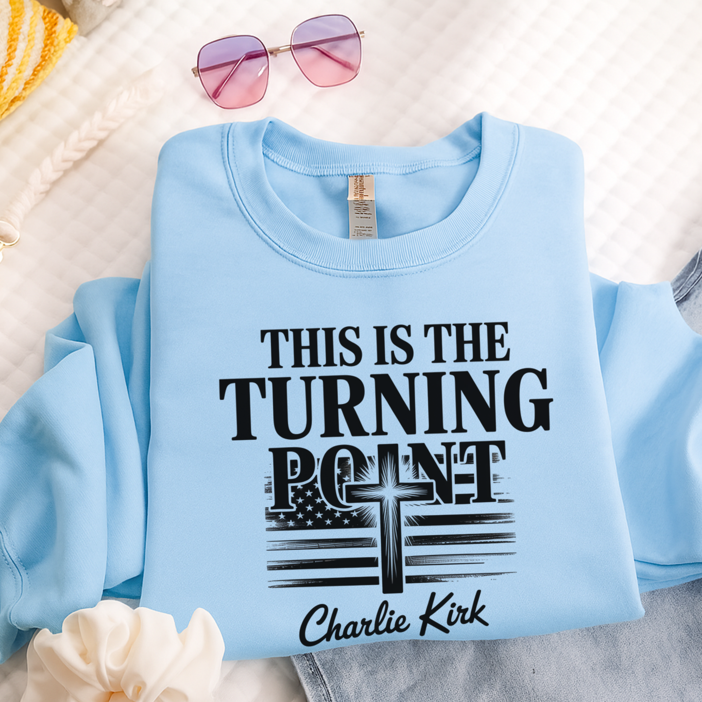 Flat lay light blue sweatshirt with “This Is the Turning Point” Christian patriotic cross design