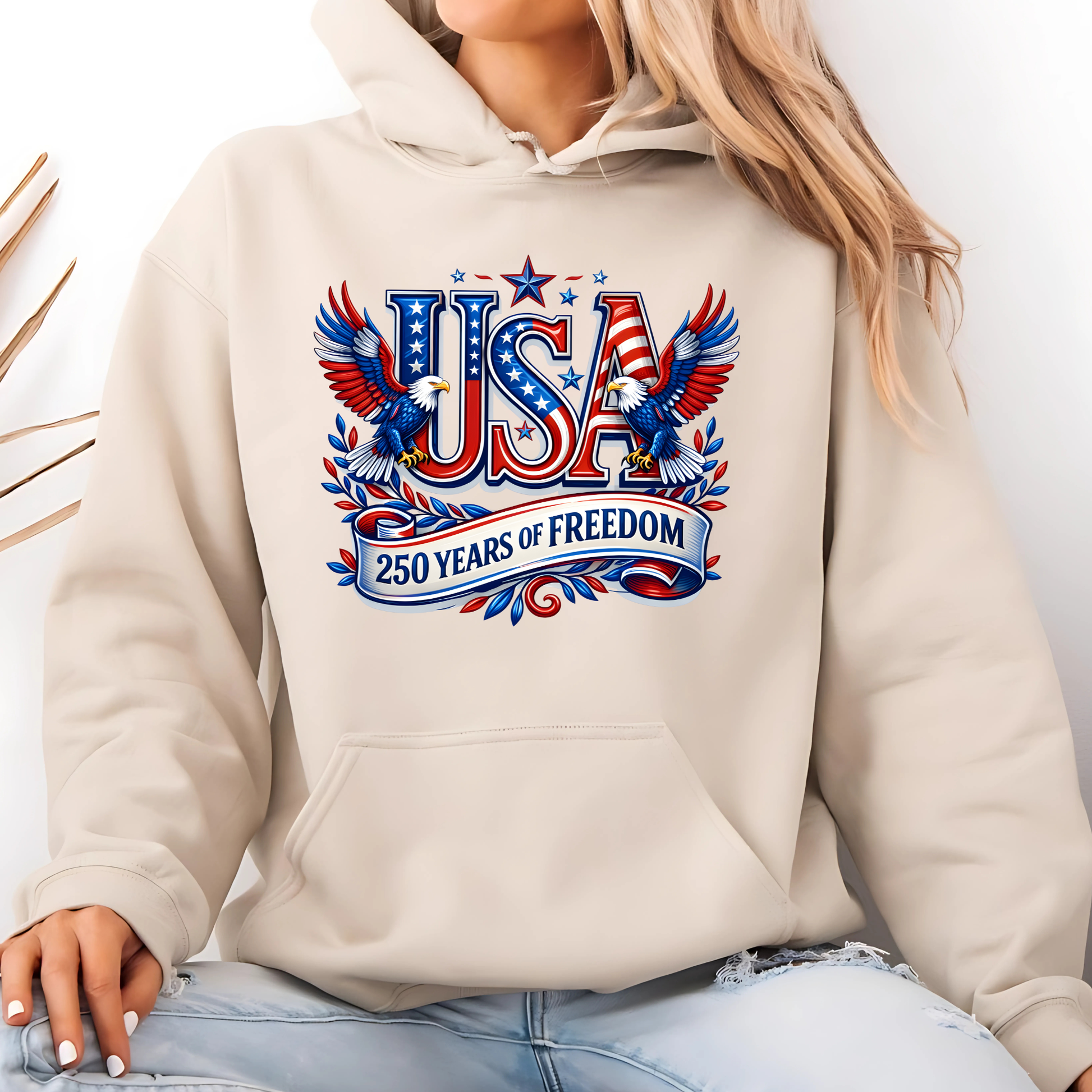 Beige hoodie with 'USA 250 Years of Freedom' design featuring eagles and stars.