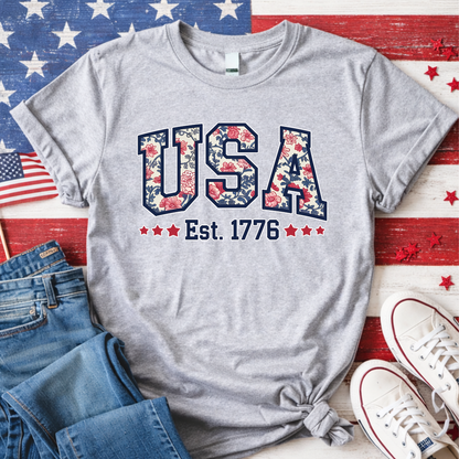 Sports Gray T-Shirt image: Sports gray USA Est. 1776 floral patriotic t-shirt – America 250th anniversary tee for women.