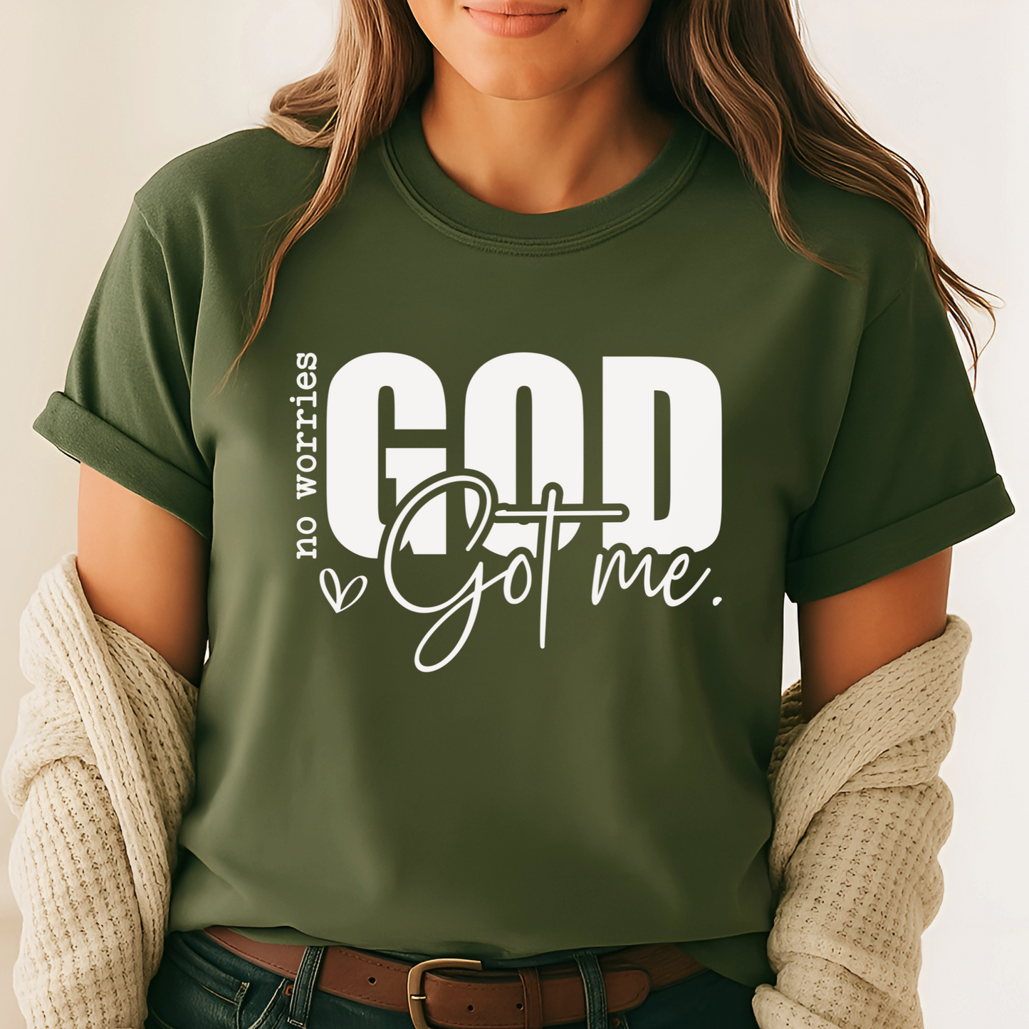 Green No Wrries, God Got Me unisex T-shirt modeled by woman