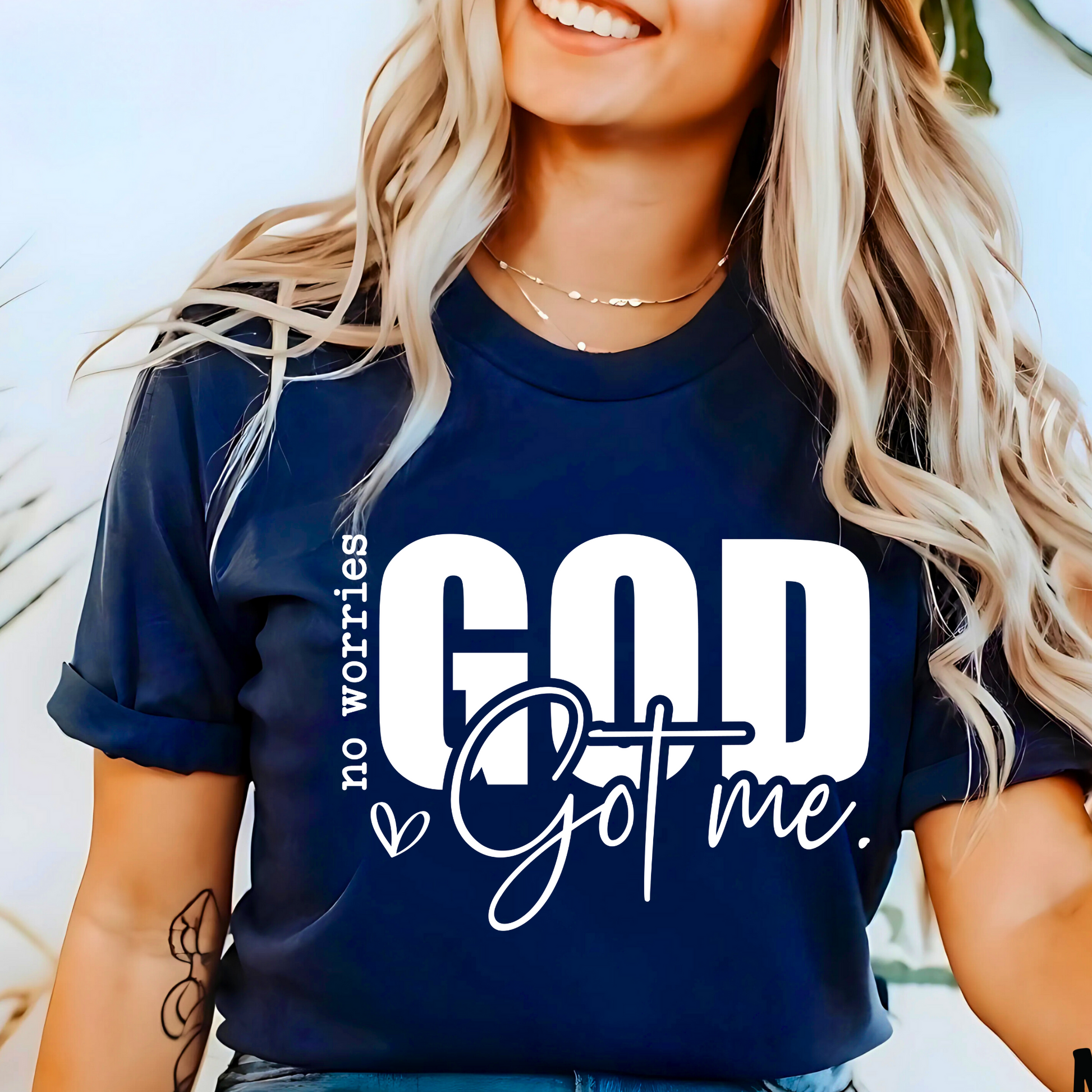Navy blue God Got Me T-shirt with bold faith lettering, casual style