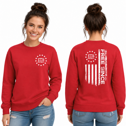 Front and back views of a red crewneck sweatshirt with a white 1776 Patriot chest emblem and distressed Free Since flag graphic