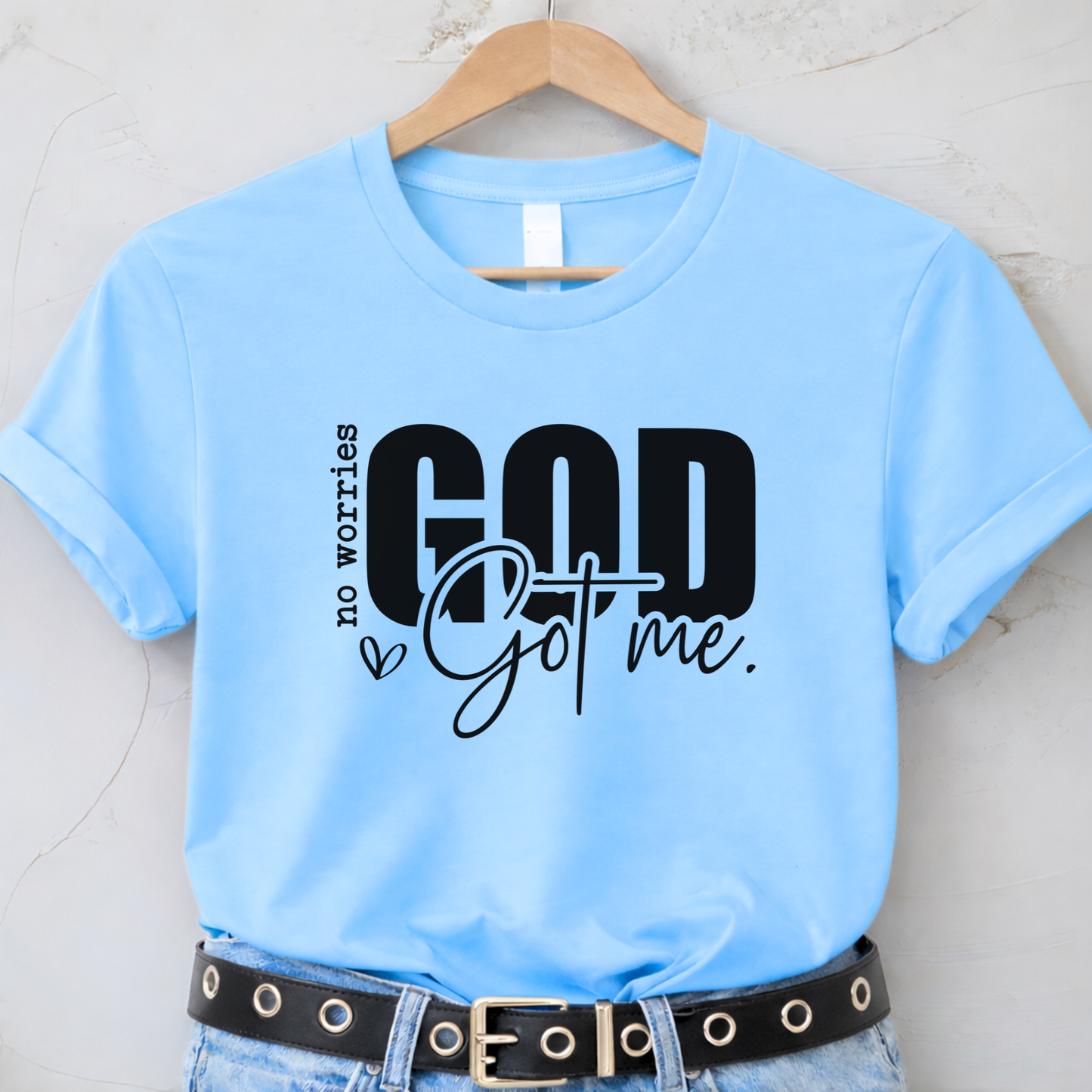 b;ue flat-lay T-shirt on hanger