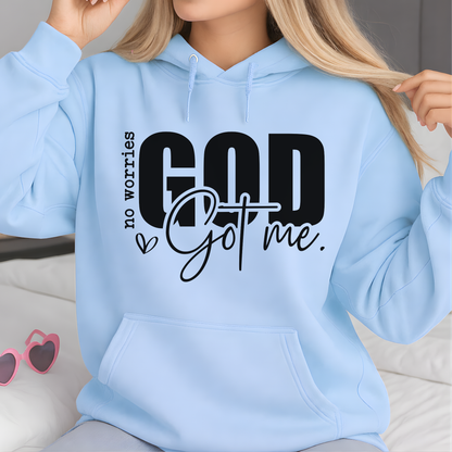 Woman wearing a Christian Faith sweatshirt that reads "No worries, GOD got me?