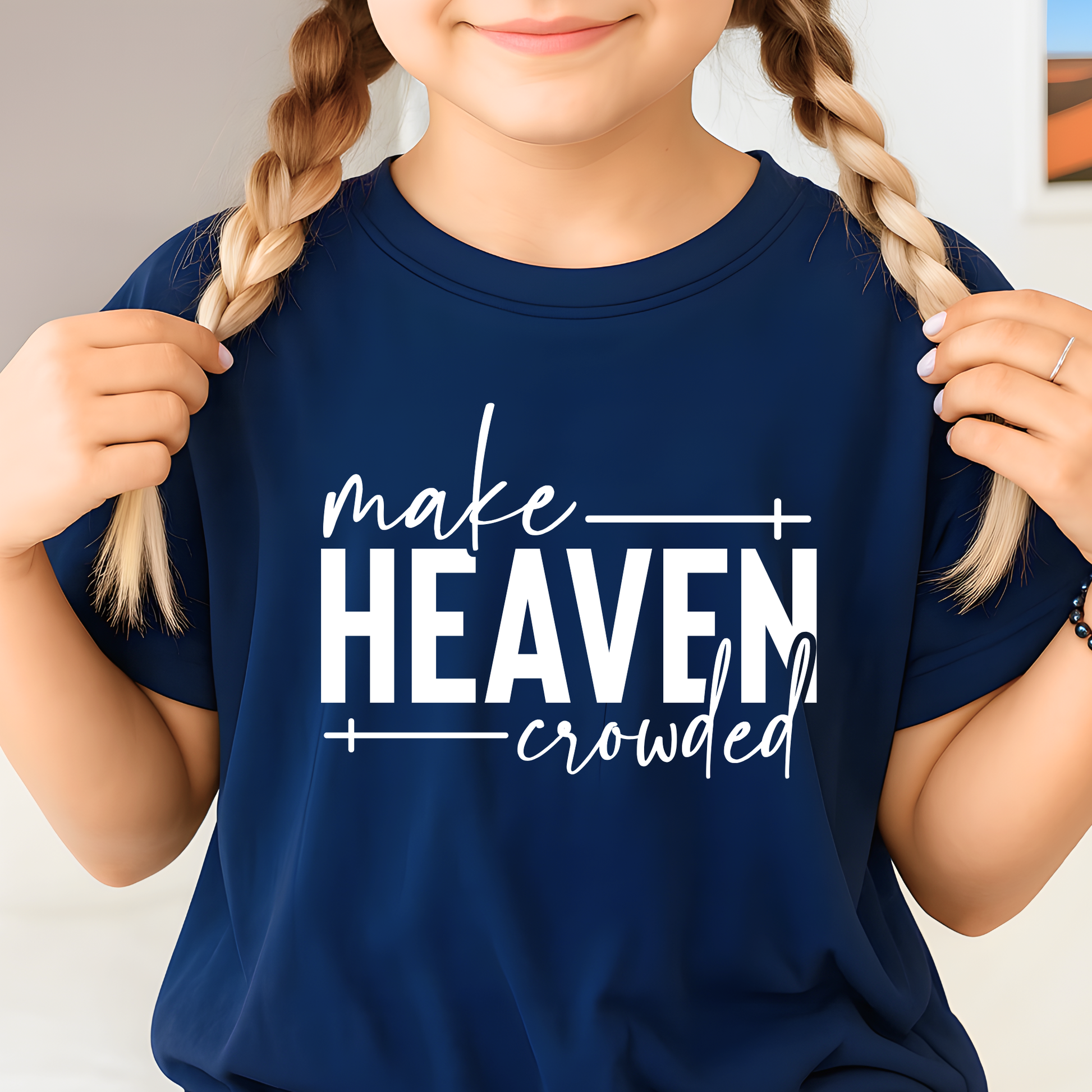 Girl wearing navy blue Make Heaven Crowded t-shirt close up
