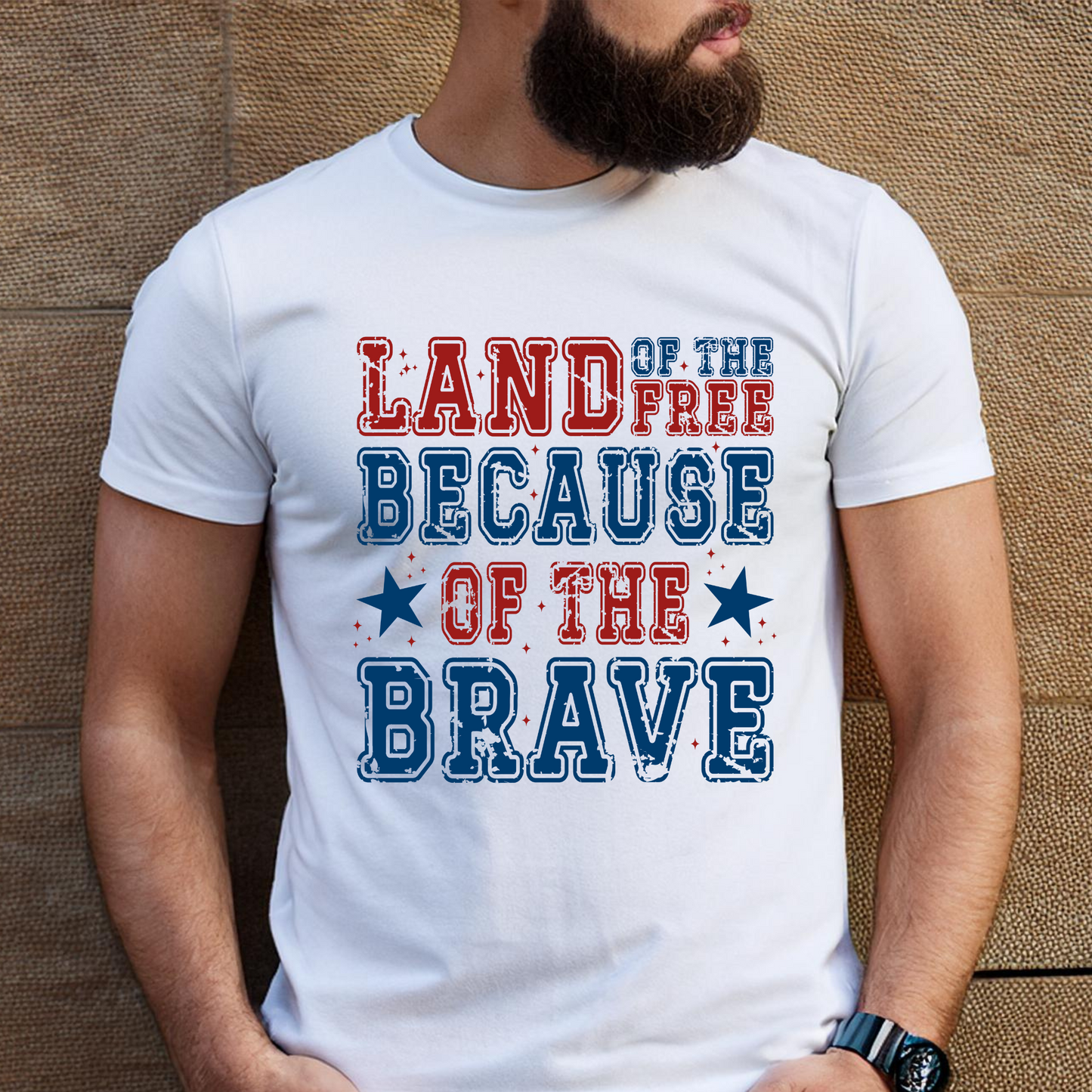 Bearded man in white shirt with bold patriotic message and USA flag print
