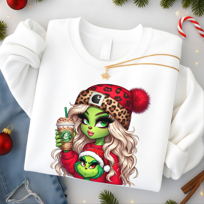 White sweatshirt folded – Boujee Green Girl Christmas design with leopard hat and festive drink