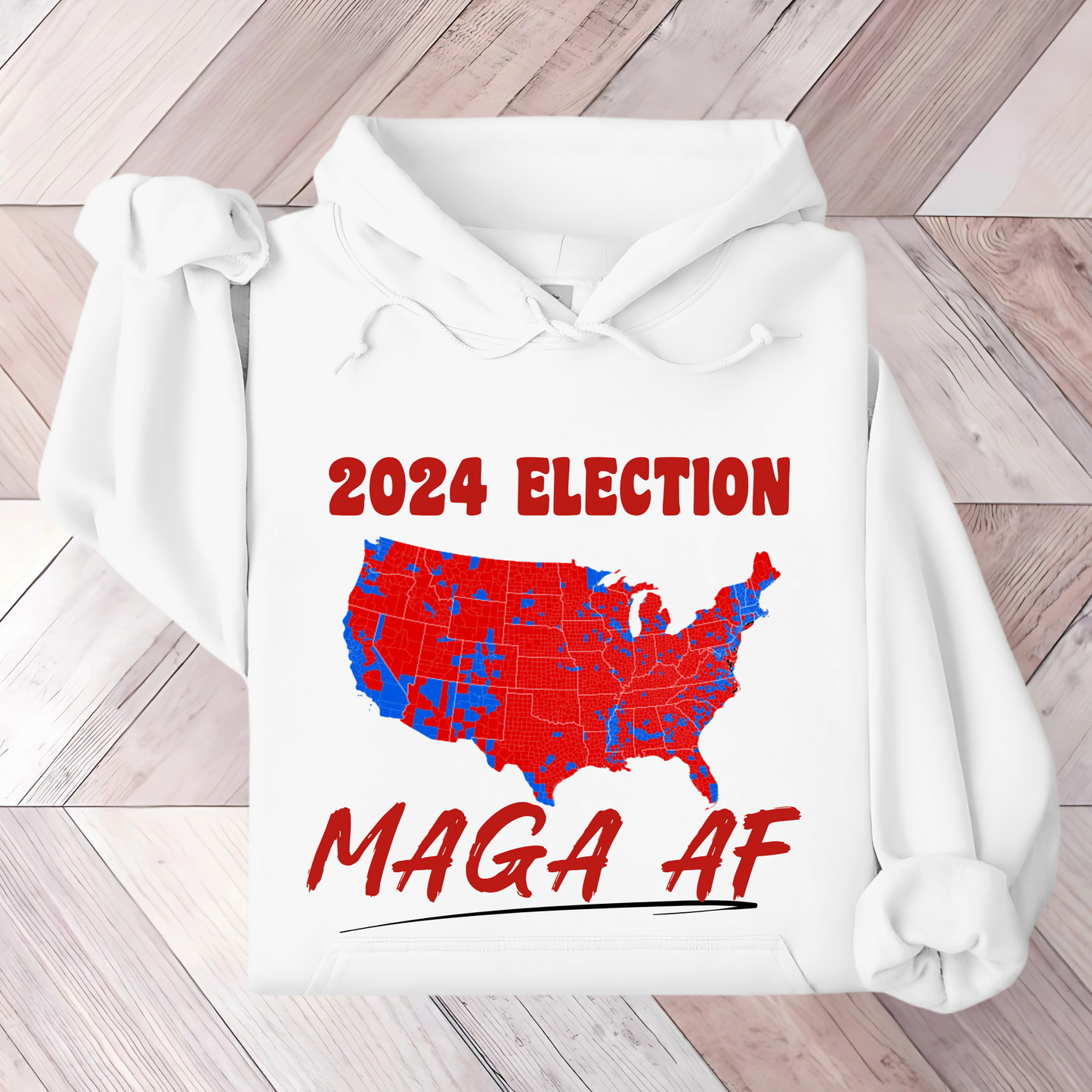 White Folded patriotic hoodie featuring red and blue American map with bold text