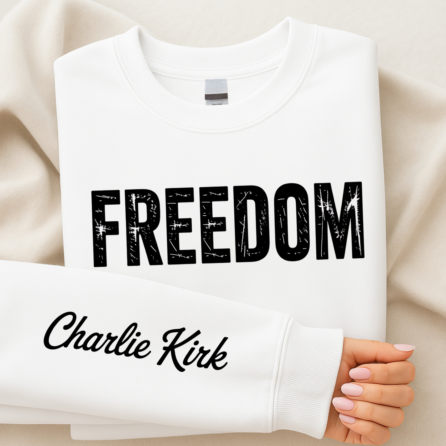 White Charlie Kirk Freedom sweatshirt with sleeve tribute detail