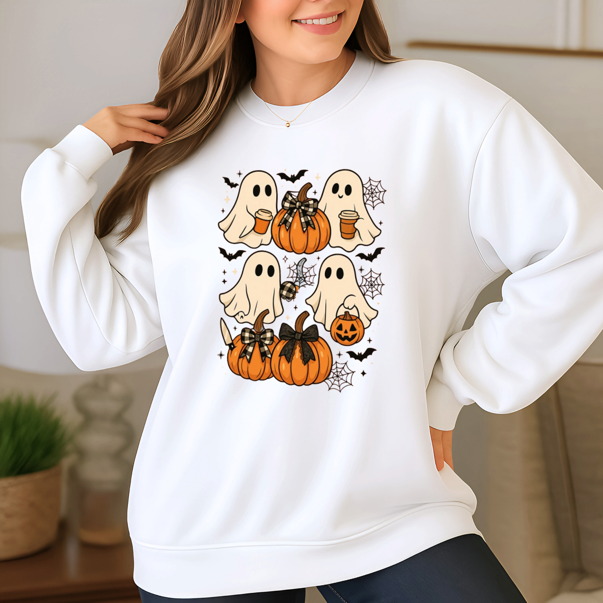 White Halloween sweatshirt with cute ghost and pumpkin print. Cozy fall pullover styled for Halloween events, casual autumn days, and pumpkin spice season.