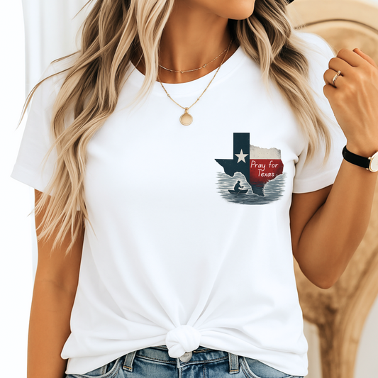 White “Pray for Texas” Christian t-shirt for women, with Texas flood relief graphic and knotted front, styled with denim shorts.