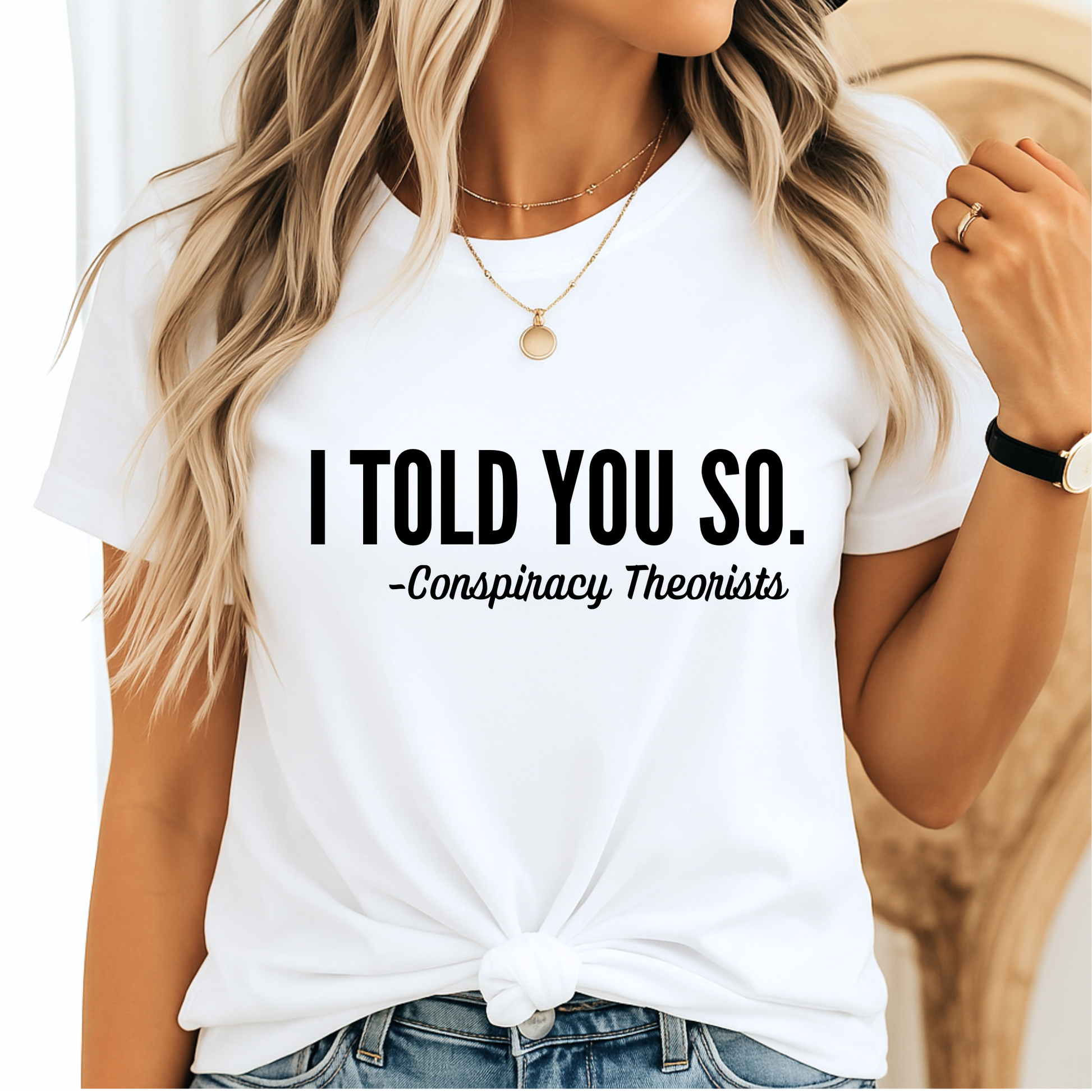 White T-shirt with “I Told You So - Conspiracy Theorists” bold black text