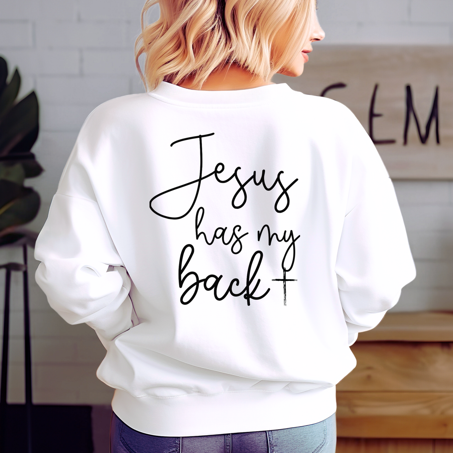White sweatshirt with bold inspirational back graphic