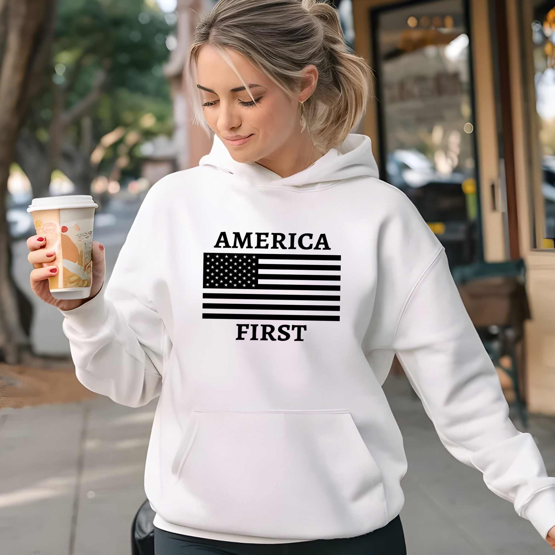 White unisex America First hoodie on woman – freedom sweatshirt