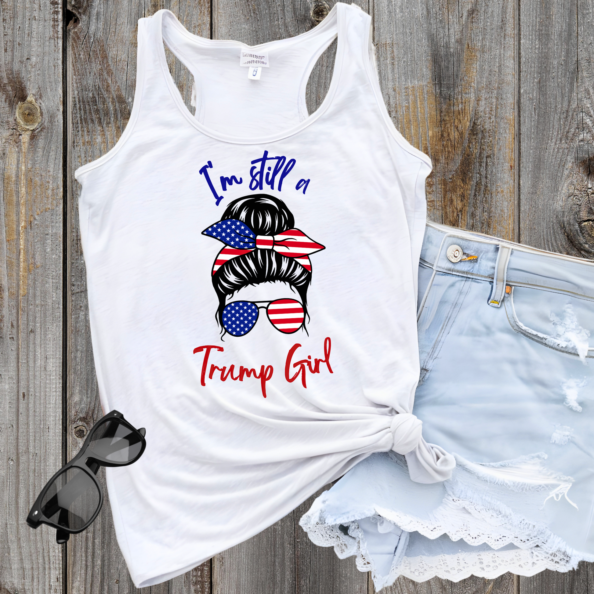 White women’s racerback tank with patriotic bun and sunglasses graphic