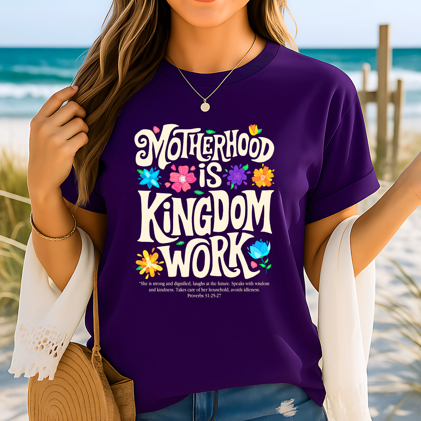 Woman at the beach in purple faith-based shirt