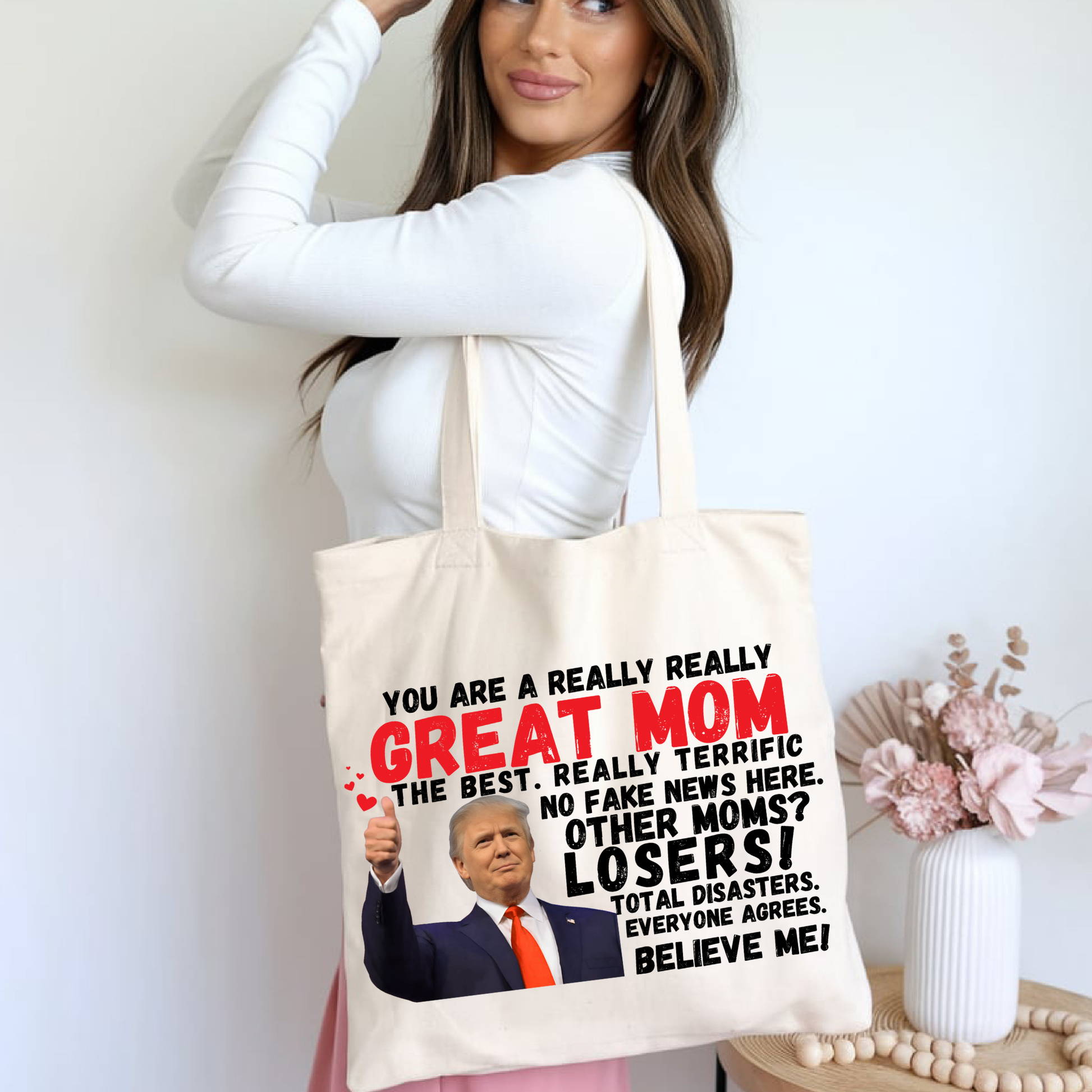 Woman modeling canvas tote indoors – funny political mom gift