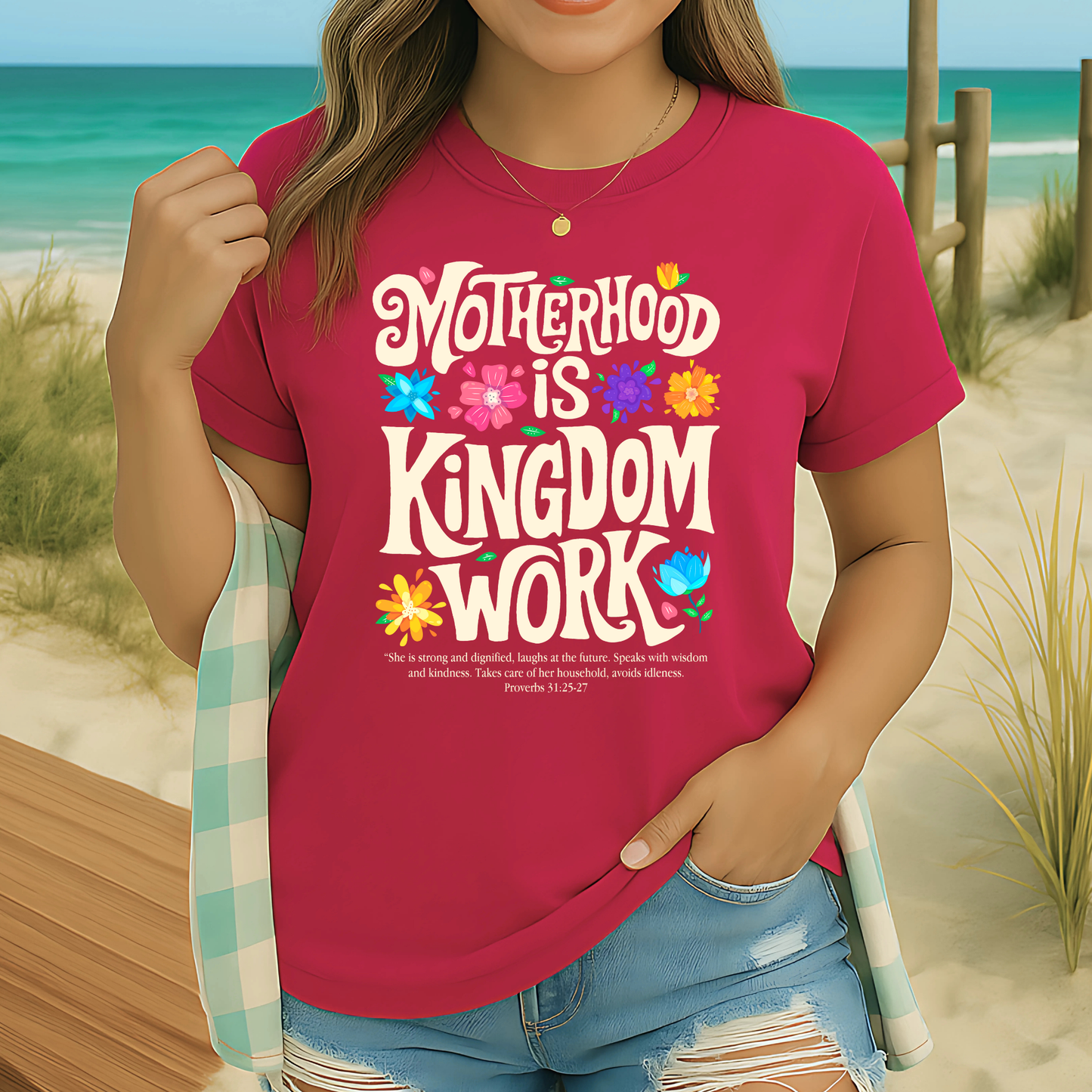 Woman in cozy outfit wearing dark pink Christian mom tee