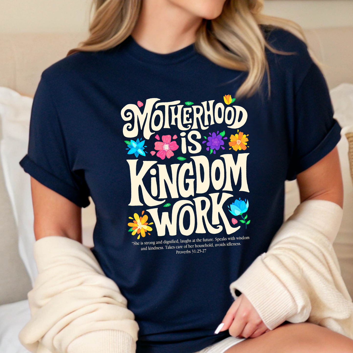 Woman in cozy outfit wearing navy Christian mom tee