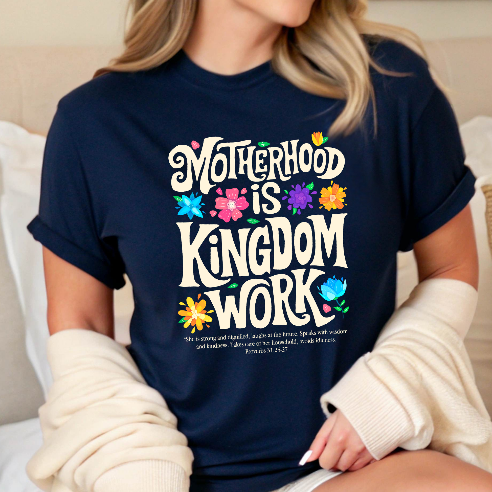 Woman in cozy outfit wearing navy Christian mom tee