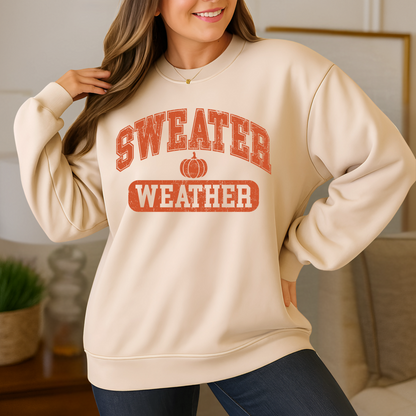 Woman in tan sweatshirt with pumpkin design – cozy fall sweatshirt
