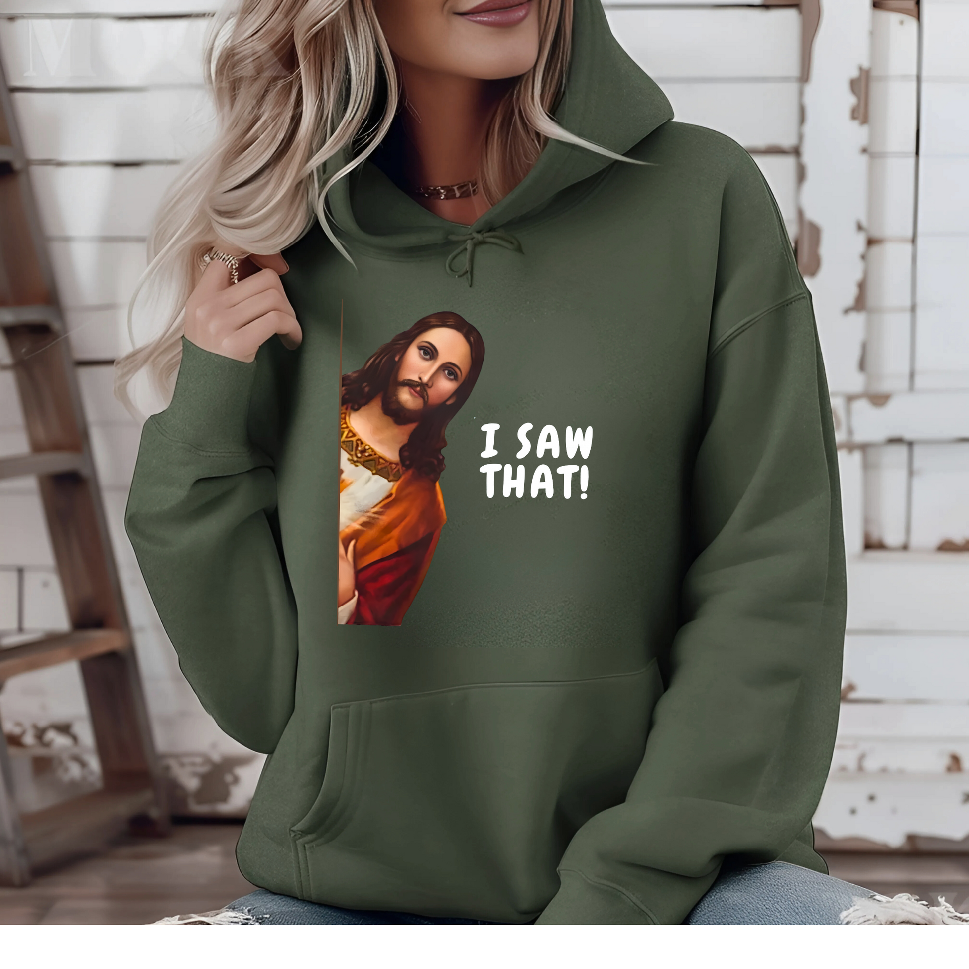 Woman wearing I Saw That funny Jesus graphic hoodie in green
