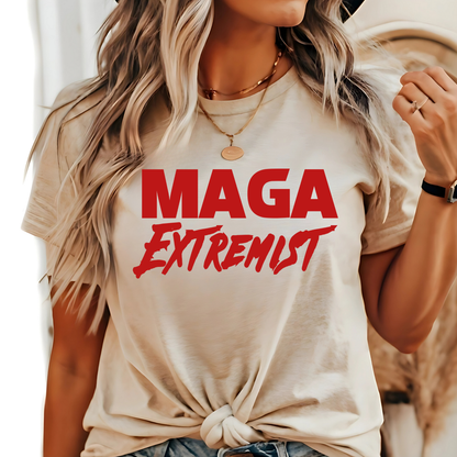 Woman wearing Sand T-shirt with bold red statement text graphic, tied hem style.