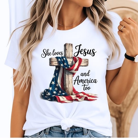 Woman wearing “She Loves Jesus and America Too” shirt in white – close-up
