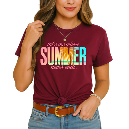 Woman wearing “Take Me Where Summer Never Ends” tee in maroon with rolled sleeves