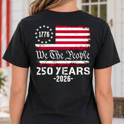 Woman wearing a black America 250 t-shirt with a design celebrating 250 years since 1776.