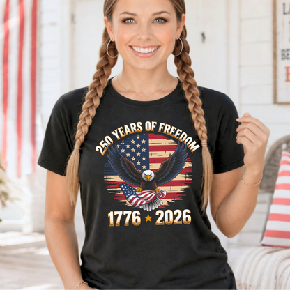 Woman wearing a black t-shirt with an eagle and American flag design, celebrating 250 years of freedom.