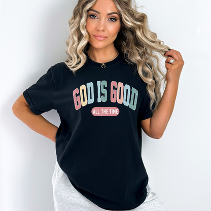 Woman wearing black God Is Good All the Time graphic T-shirt