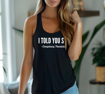 Woman wearing black racerback tank with "I Told You So - Conspiracy Theorists" quote