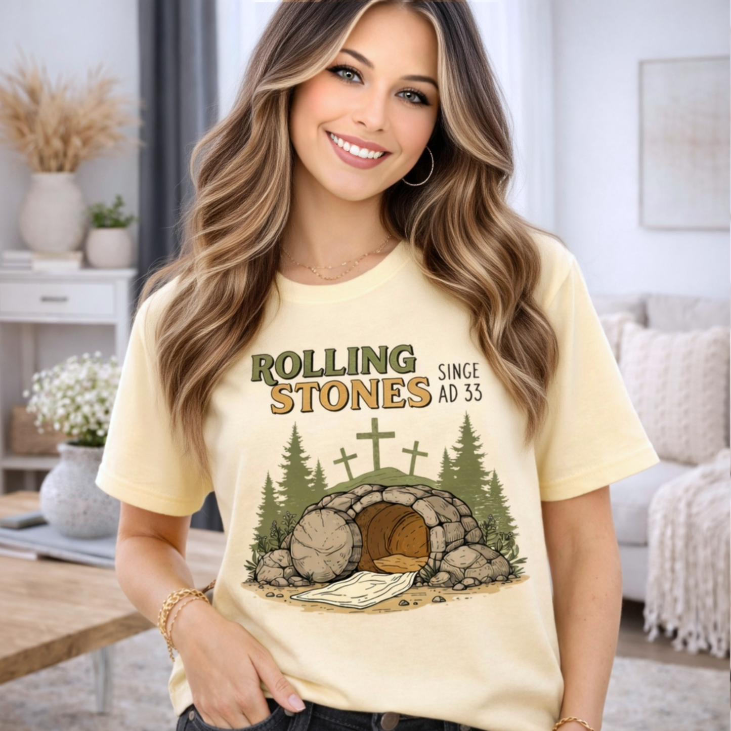 Woman wearing butter yellow Comfort Colors Christian t-shirt with Rolling Stones AD 33 design in bright indoor setting