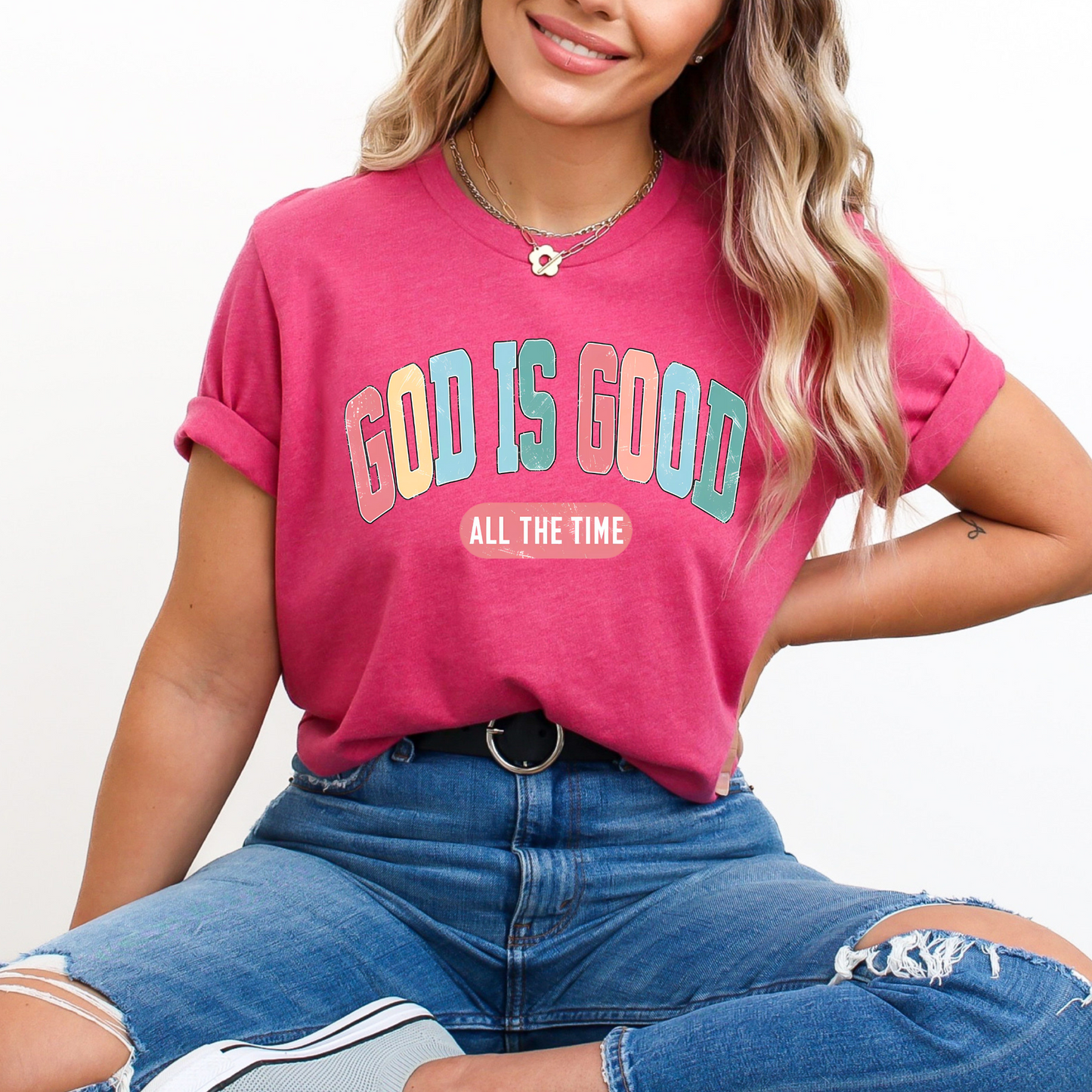 Woman wearing a Dark Pink God Is Good All The Time’  graphic tee.