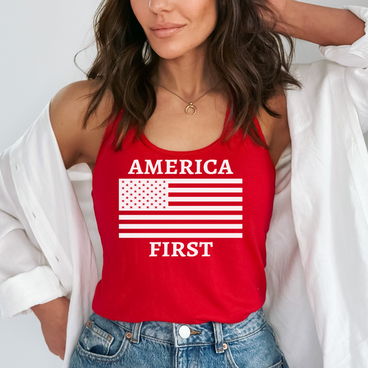 Woman wearing red tank with bold white America First and flag graphic, styled with denim

