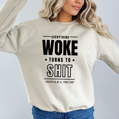 Woman wearing sand-colored sweatshirt with bold black print