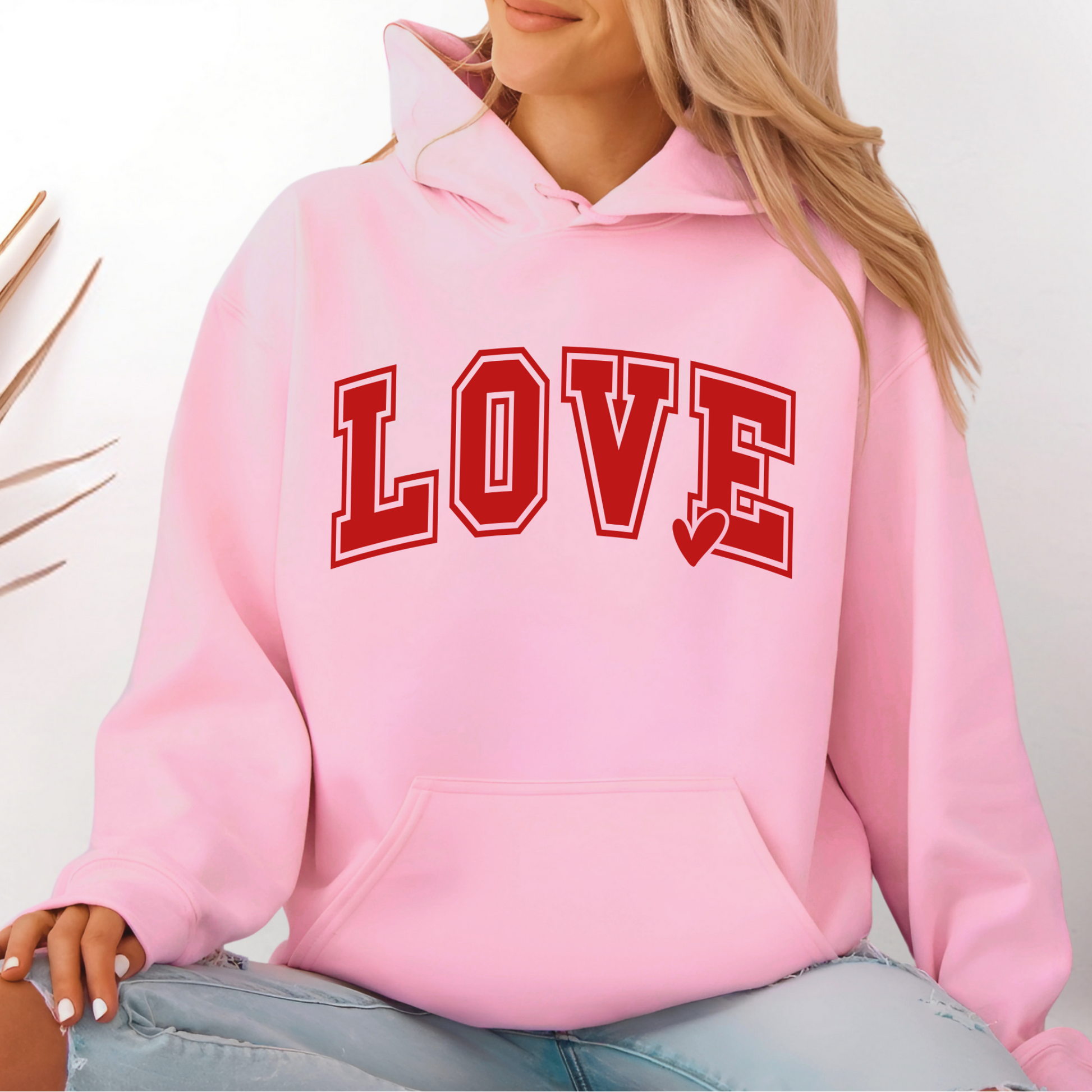 Women’s unisex LOVE hoodie in pink with varsity lettering