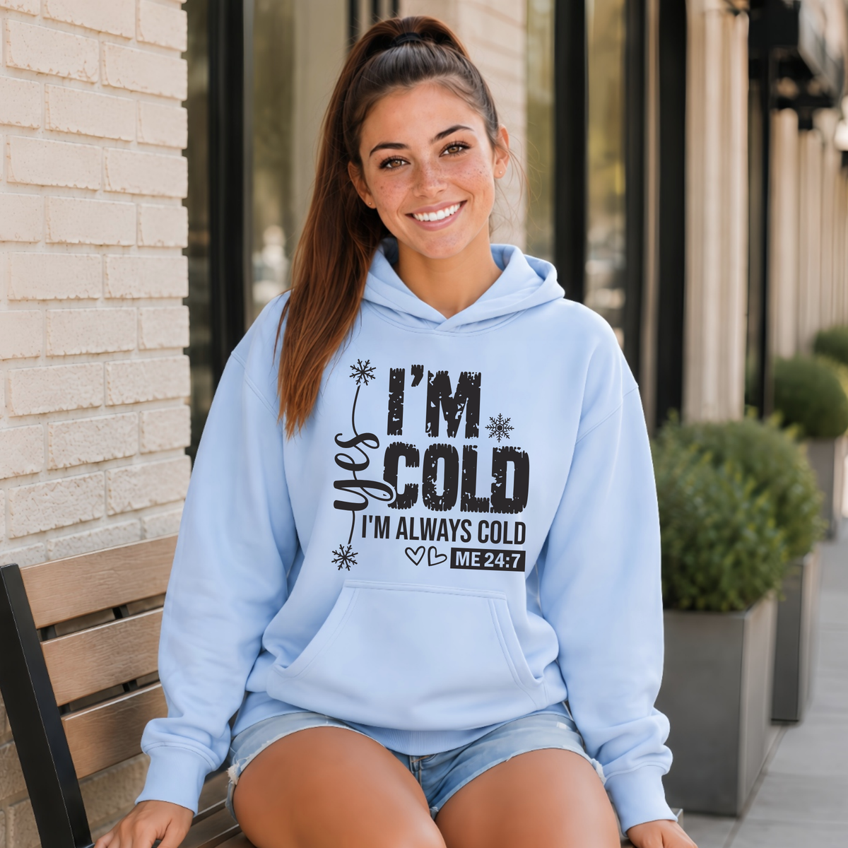 Light blue hoodie with Yes I'm Cold graphic for women